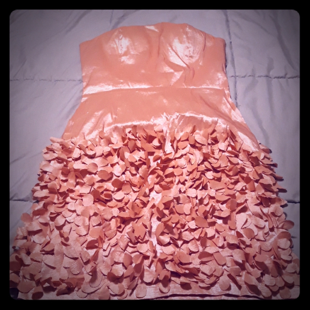 Peach summer party dress with detail at bottom